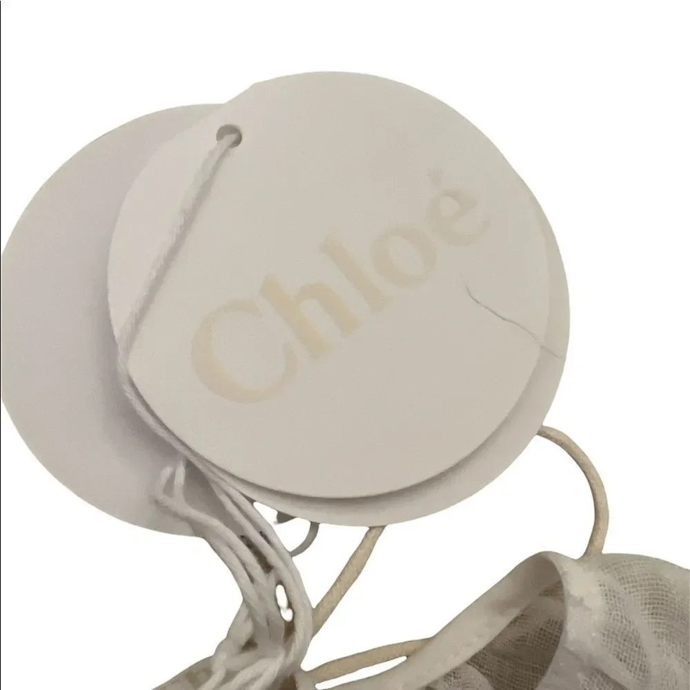 Chloé white lined eyelet dress lots of unique detail